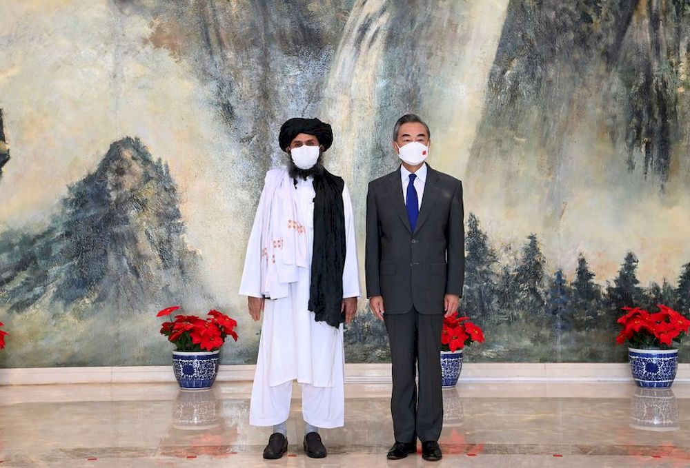 Chinese State Councilor and Foreign Minister Wang Yi meets with Mullah Abdul Ghani Baradar, political chief of Afghanistanu00e2u20acu2122s Taliban, in Tianjin, China July 28, 2021. u00e2u20acu201d Xinhua pic via Reuters