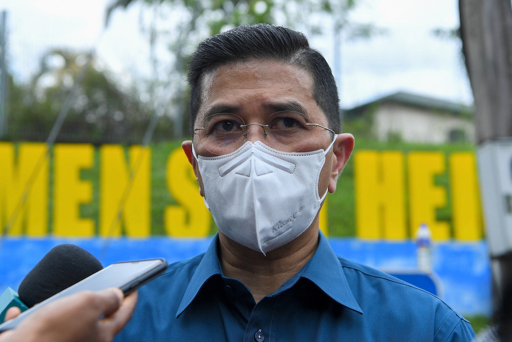 Datuk Seri Azmin Ali speaks to the media after visiting the site of the landslide at Kemensah Heights, September 18, 2021. u00e2u20acu201d Bernama pic