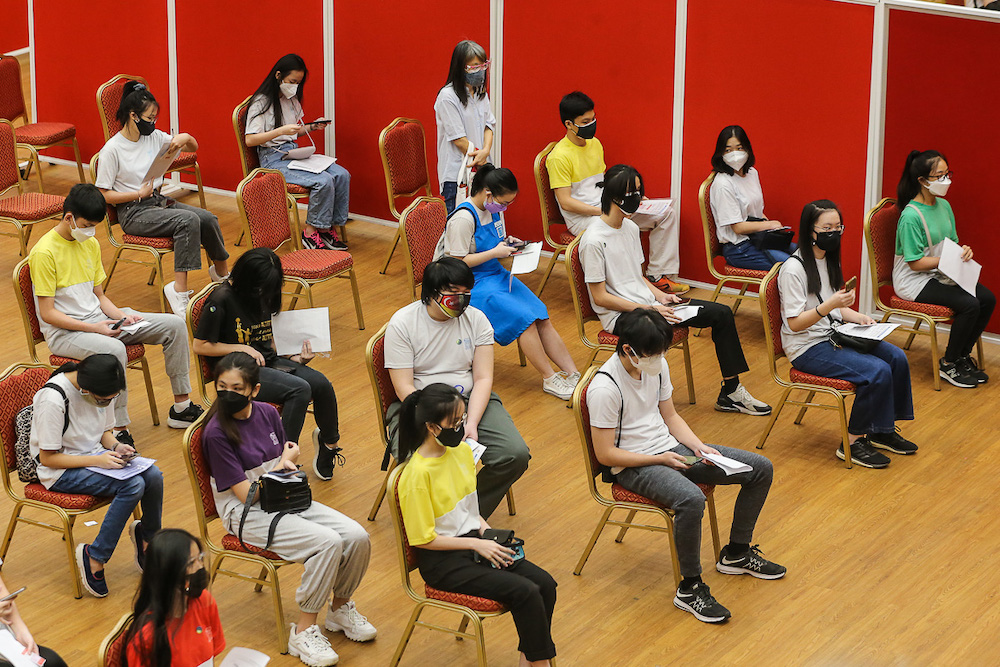 Students wait to get their Covid-19 vaccination at the MSU Medical Centre in Shah Alam September 20, 2021. u00e2u20acu201d Picture by Yusof Mat Isa