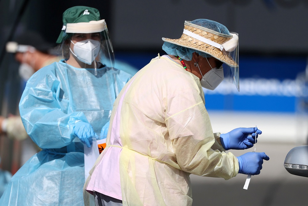 A medical worker administers a Covid-19 test at a testing clinic during a lockdown to curb the spread of a coronavirus disease outbreak in Auckland August 26, 2021. u00e2u20acu201d Reuters pic