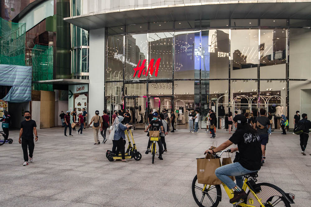 People are seen wearing protective masks as they walk along the Bukit Bintang shopping area during Phase One of the National Recovery Plan in Kuala Lumpur on September 4, 2021. u00e2u20acu201d Picture by Firdaus Latifnn