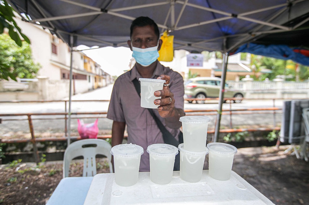 V. Velayudum , shunned by his family eight years ago now runs his own business. u00e2u20acu201d Picture by Farhan Najib