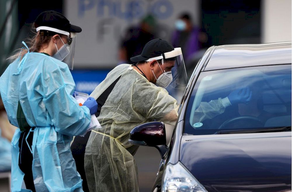 A medical worker administers a Covid-19 test at a testing clinic during a lockdown to curb the spread of a coronavirus disease (Covid-19) outbreak in Auckland, New Zealand, August 26, 2021. u00e2u20acu201d Reuters pic