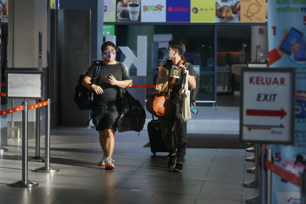 Travellers to Langkawi are pictured arriving at KLIA2, Sepang September 16, 2021. u00e2u20acu201d Picture by Ahmad Zamzahurinn