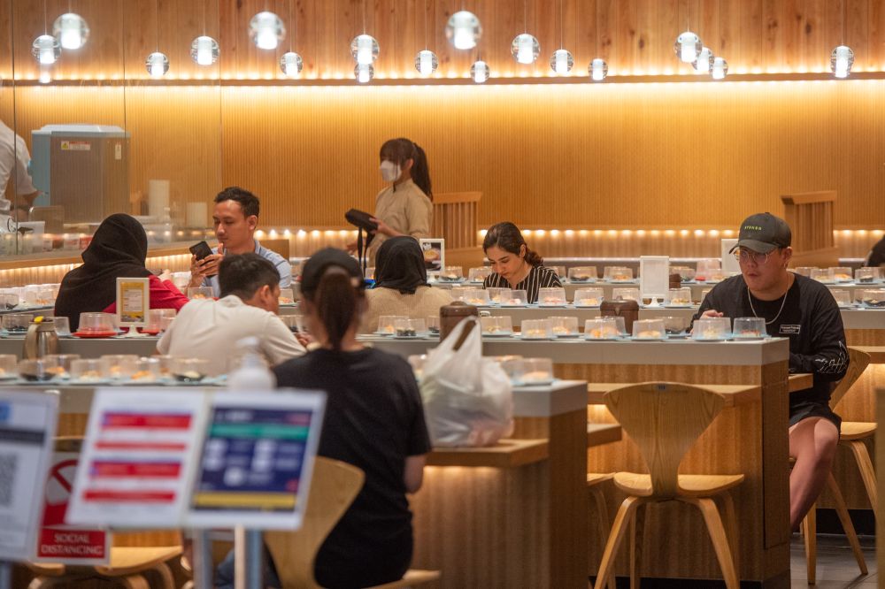 Patrons dine-in at a restaurant in Kuala Lumpur during Phase Two of the National Recovery Plan on September 10, 2021. u00e2u20acu201d Picture by Shafwan Zaidon