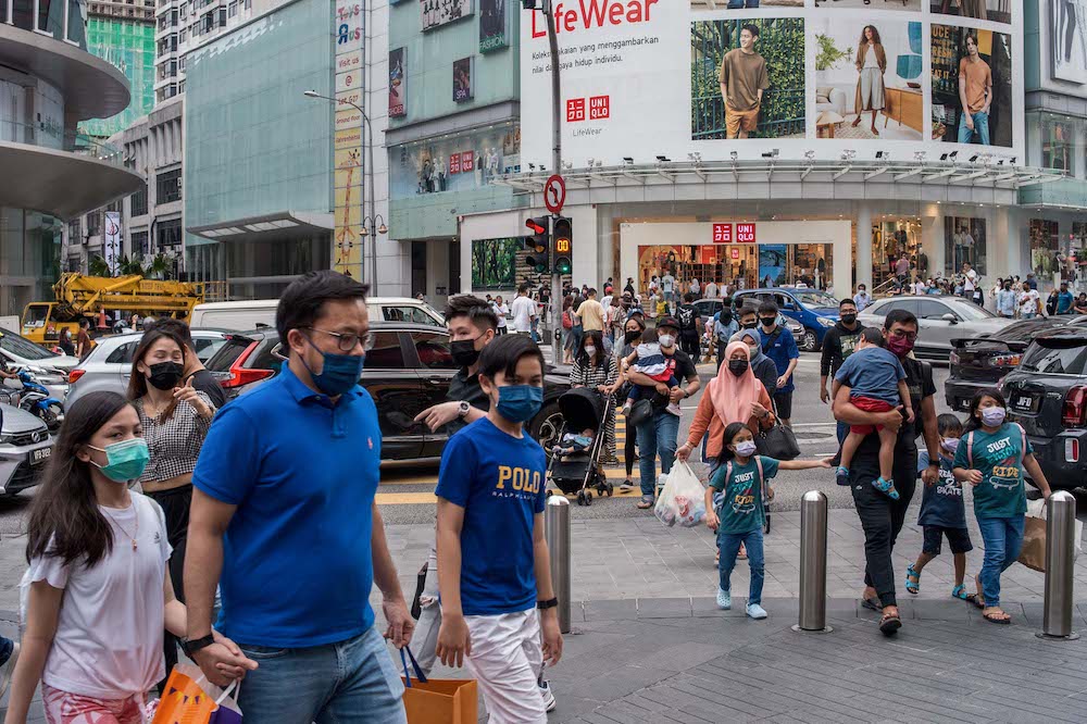 People are seen wearing masks at Jalan Bukit Bintang in Kuala Lumpur, October 2, 2021. u00e2u20acu201d Picture by Shafwan Zaidon