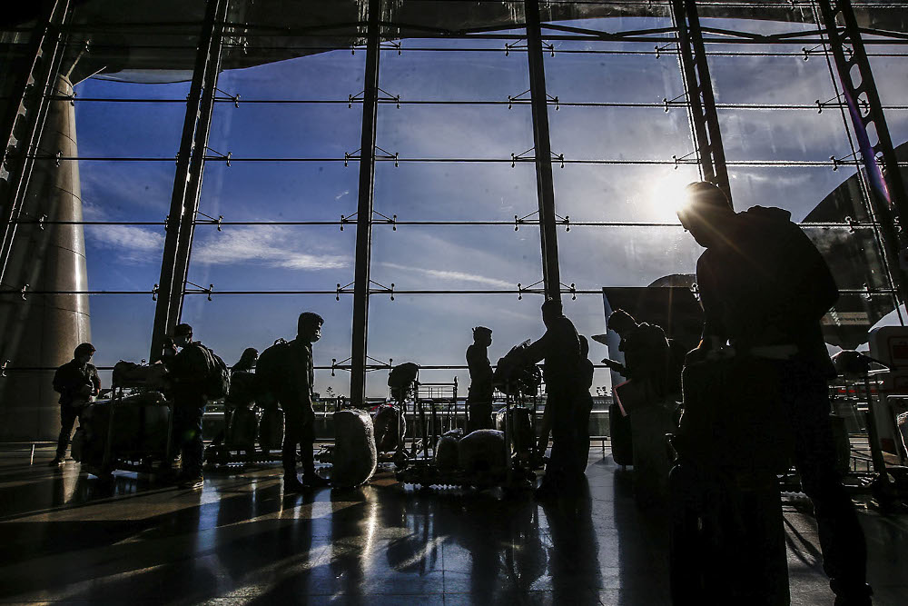 Travellers are seen with their luggage at the Kuala Lumpur International Airport after the government gave permission for fully-vaccinated Malaysians to travel abroad October 17, 2021. u00e2u20acu2022 Picture by Hari Anggara