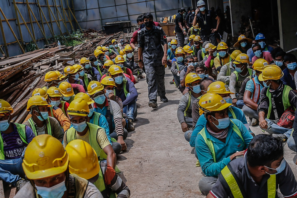 A total of 213 foreign construction workers were detained in an integrated operation known as Op Mahir at a Wangsa Maju construction site in Setapak October 20, 2021. u00e2u20acu2022 Picture by Hari Anggara