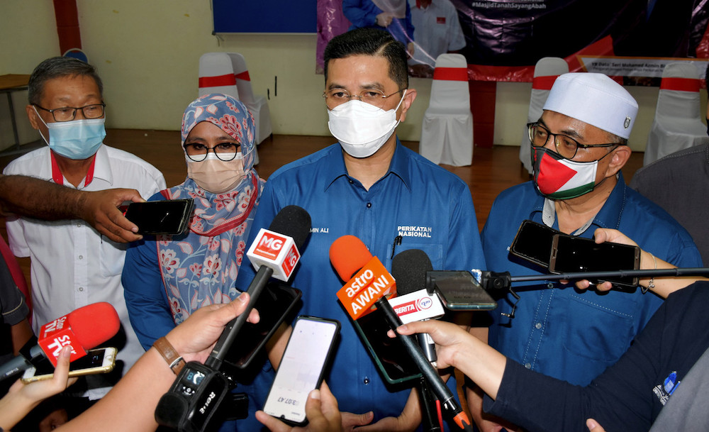 PN election director Datuk Seri Azmin Ali speaks to reporters after attending a meeting with the Masjid Tanah PN machinery near Alor Gajah October 24, 2021. u00e2u20acu201d Bernama