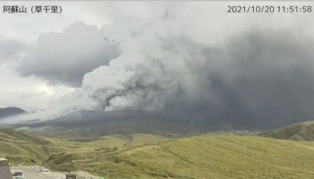 A video grab from the Japan Meteorological Agency's live camera image shows an eruption of Mount Aso in Aso, Kumamoto prefecture, southwestern Japan, October 20, 2021. u00e2u20acu2022 Japan Meteorological Agency/Handout via Reuters