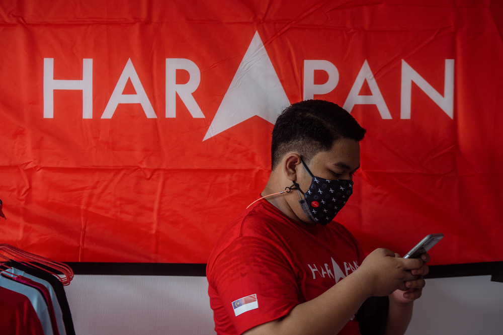 A Pakatan Harapan supporter is seen at the DAP operation room at Ayer Keroh, Melaka, November 7, 2021. u00e2u20acu201d Picture by Shafwan Zaidon 