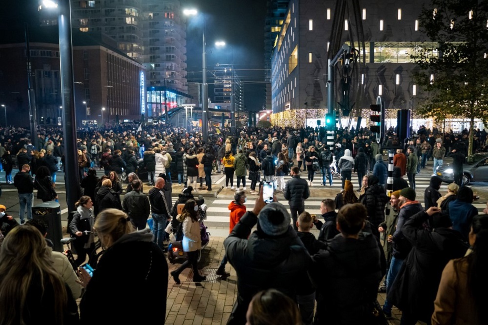 Demonstrators take part in a protest against a partial coronavirus lockdown and against the government policy on Coolsingel street November 19, 2021 in the port city of Rotterdam. u00e2u20acu201d AFP pic
