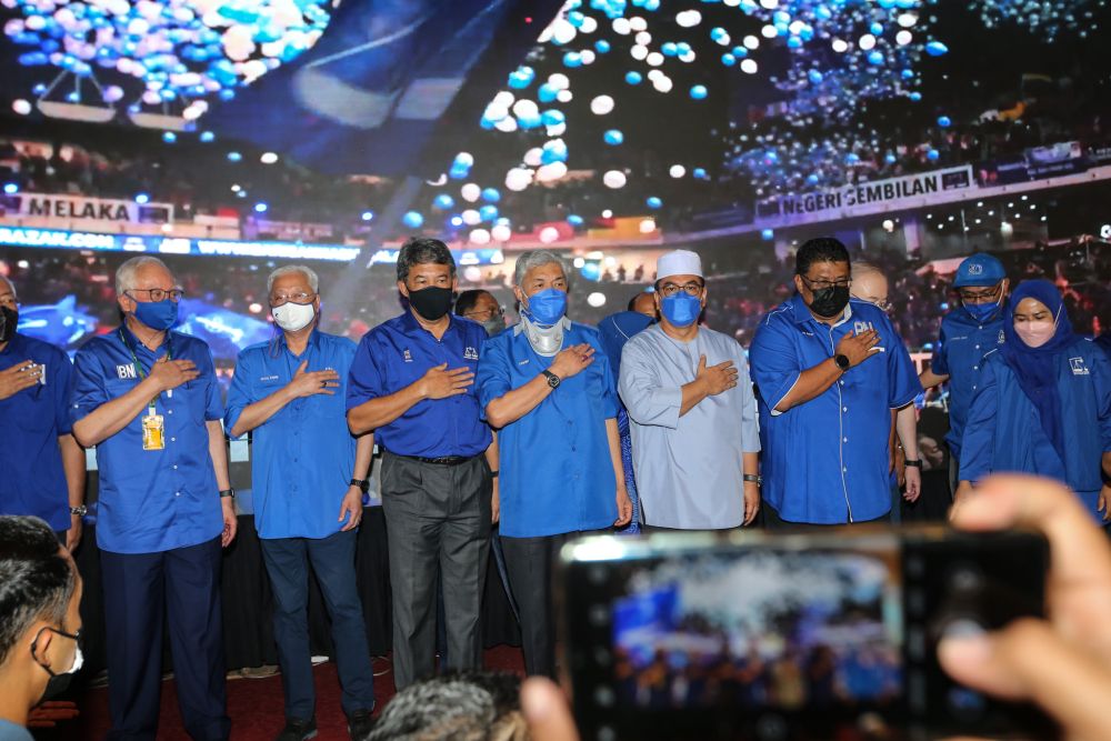 Barisan Nasional leaders pose for the cameras after the coalition was declared winner of the Melaka state election in Ayer Keroh November 20, 2021. u00e2u20acu2022 Picture by Ahmad Zamzahuri