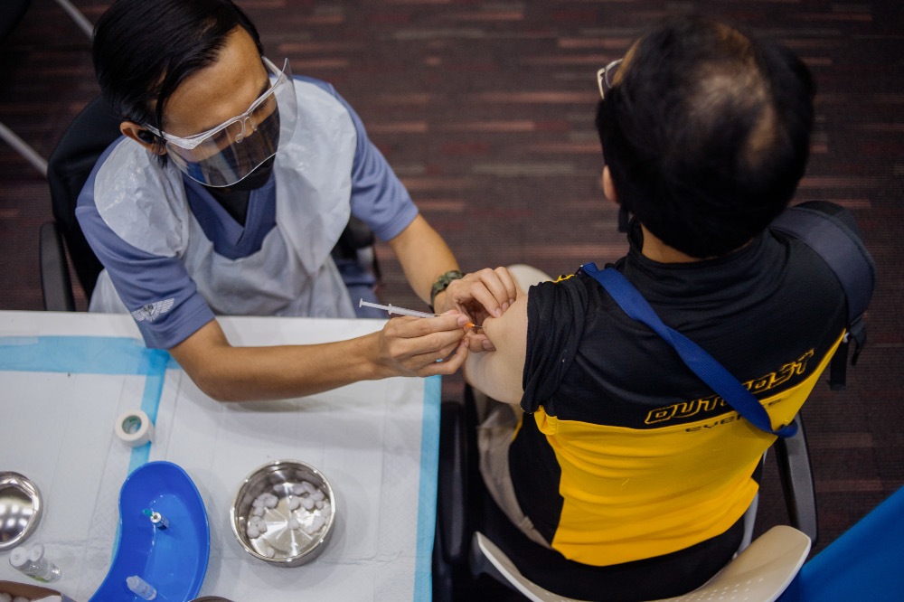 People receive their Covid-19 booster jabs at the UEM Learning Centre in Petaling Jaya, November 24, 2021. u00e2u20acu201d Picture by Shafwan Zaidon     