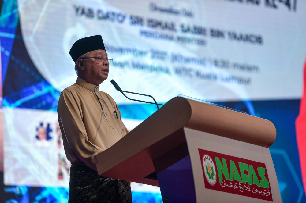 Prime Minister Datuk Seri Ismail Sabri Yaakob delivers a speech at the dinner and opening ceremony of the 47th Annual General Meeting of the National Farmers Organisation at the World Trade Centre in Kuala Lumpur, November 25, 2021. u00e2u20acu201d Bernama pic 