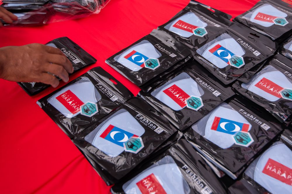 Face masks featuring Pakatan Harapan and PKR logos are seen for sale at Pakatan Harapanu00e2u20acu2122s command centre in Malim Jaya, Melaka November 9, 2021. u00e2u20acu2022 Picture by Shafwan Zaidon