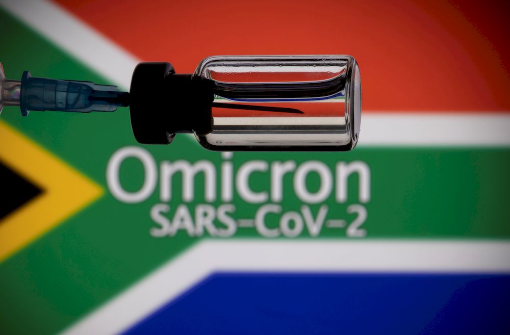 A vial and a syringe are seen in front of a displayed South Africa flag and words u00e2u20acu02dcOmicron SARS-CoV-2u00e2u20acu2122 in this illustration taken, November 27, 2021. u00e2u20acu201d Reuters pic