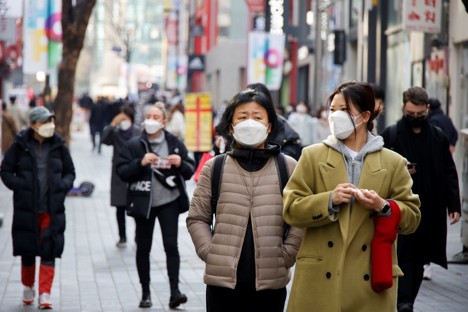 Women wearing masks walk in a shopping district amid the coronavirus disease pandemic in Seoul November 29, 2021. u00e2u20acu201d Reuters pic