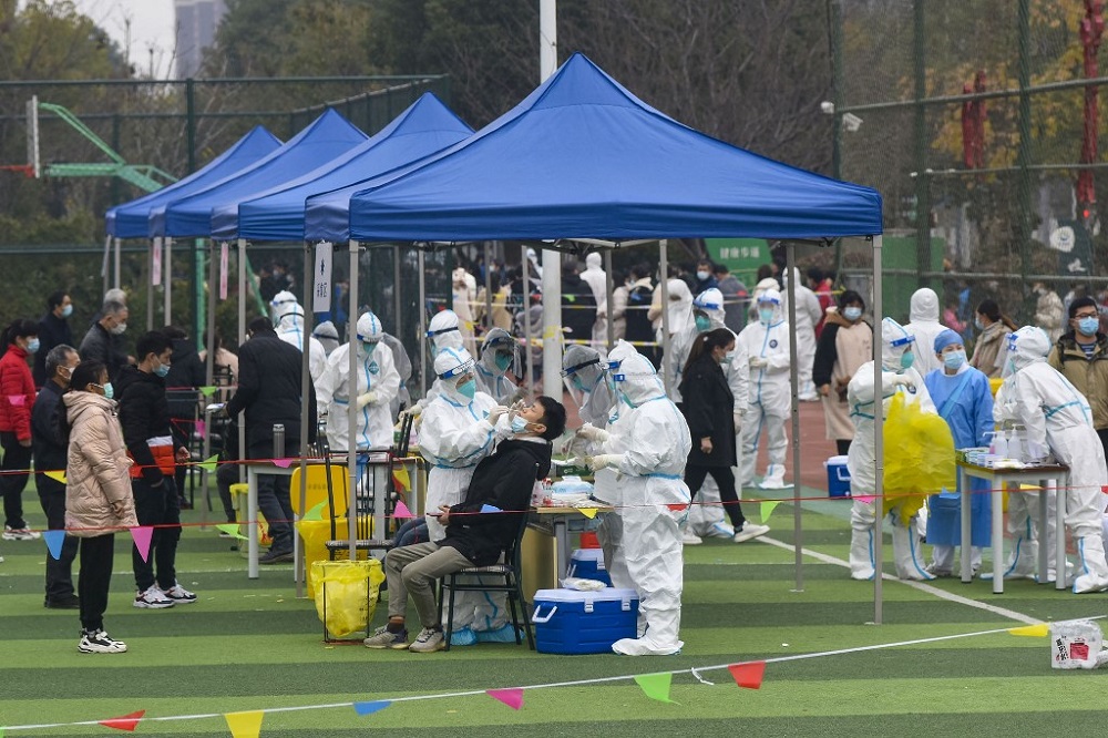 Residents undergo nucleic acid tests for the Covid-19 coronavirus in Ningbo in Chinau00e2u20acu2122s eastern Zhejiang province December 8, 2021. u00e2u20acu201d AFP pic