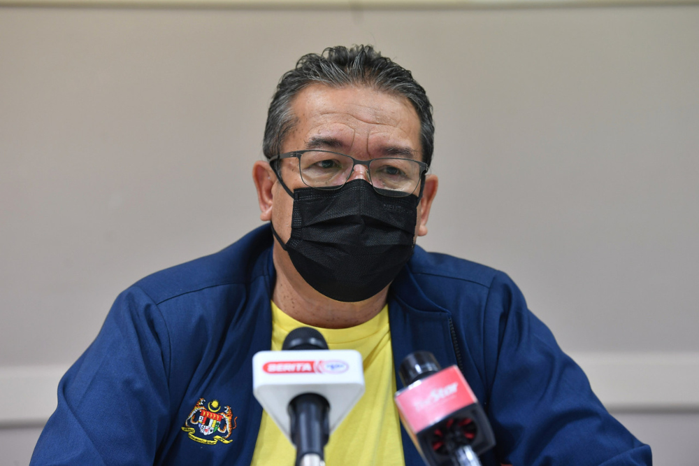 Minister in the Prime Ministeru00e2u20acu2122s Department (Special Functions) Datuk Dr Abd Latiff Ahmad speaks during a press conference in Putrajaya December 20, 2021. u00e2u20acu201d Bernama pic