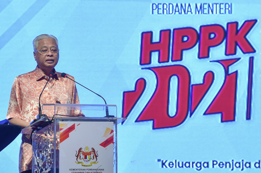 Prime Minister Datuk Seri Ismail Sabri Yaakob delivers a speech at the launch of the national-level Malaysian Family Hawkers and Petty Traders Day 2021 in Putrajaya, December 3, 2021. u00e2u20acu201d Bernama pic 
