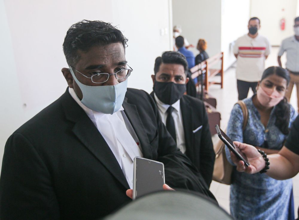 Lawyer Rajesh Nagarajan addresses reporters at the Ipoh High Court December 14, 2021. u00e2u20acu201d Picture by Farhan Najib