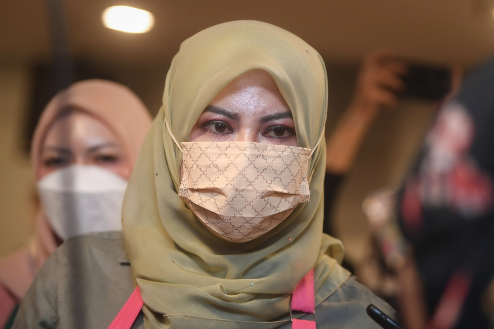 Women, Family and Community Development Minister Datuk Seri Rina Mohd Harun speaks to the media at the launch of the Keluarga Malaysia Flood Relief Fund in Kuala Lumpur, December 21, 2021. u00e2u20acu201d Bernama pic 