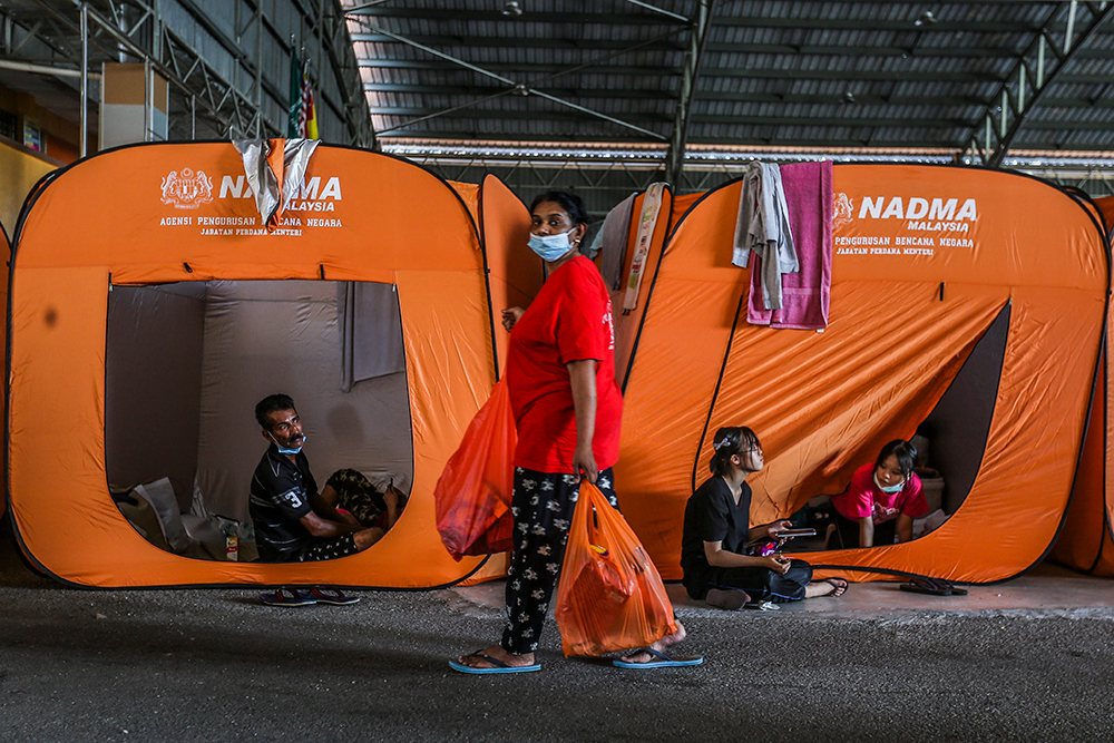 A general view of tents used by flood victims at the temporary evacuation centre (PPS) in Taman Sri Muda in Shah Alam, Selangor December 21, 2021. u00e2u20acu201d Picture by Hari Anggara