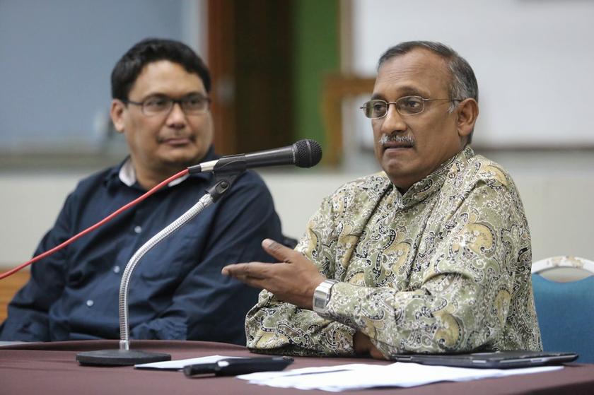 Council of Churches of Malaysia (CCM) general secretary Rev Dr Hermen Shastri (right) speaks at a forum on freedom of religion in Petaling Jaya January 13, 2014. u00e2u20acu201d Picture by Choo Choy May