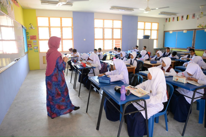 Pupils attending their first day of school at SK Sayong, Kuala Kangsar, Perak on January 12, 2015. u00e2u20acu201d Picture by K.E. Ooi