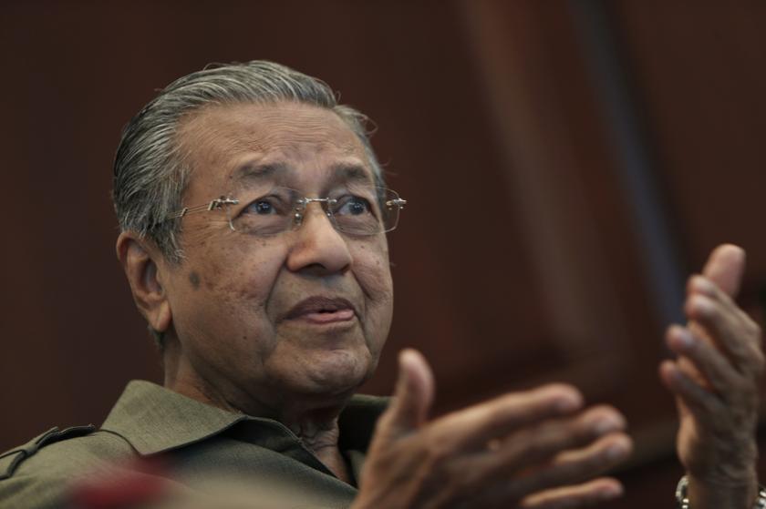 Former Malaysian prime minister Mahathir Mohamad speaks during an interview at his office in Kuala Lumpur October 18, 2013. u00e2u20acu201d Reuters pic