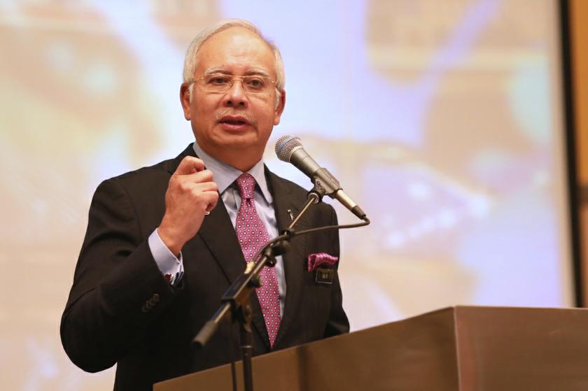 Prime Minister Datuk Seri Najib Razak opens the third annual meeting of Kelab Umno Pesara Kanan Kerajaan Malaysia (KUPKKM) in Putrajaya December 9, 2013. u00e2u20acu201d Picture by Saw Siow Feng