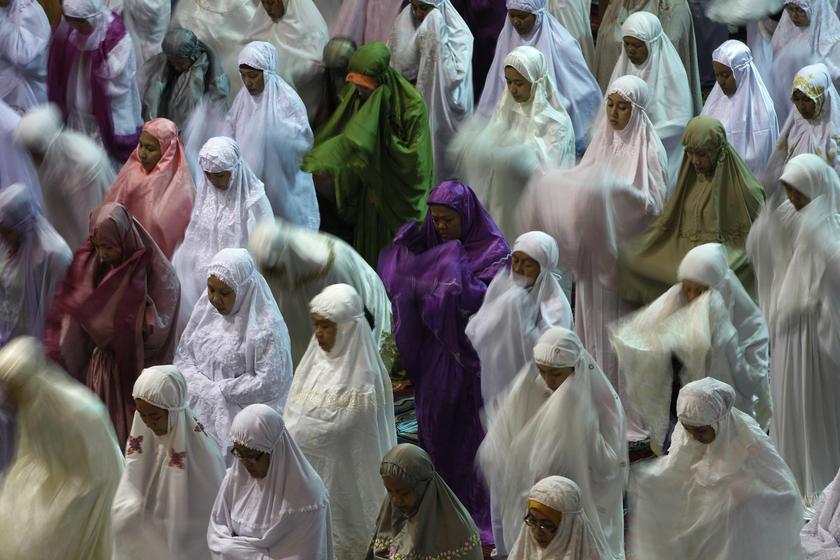 Muslim women attend an evening mass prayer session called 'tarawih' to mark the holy fasting month of Ramadan, which will begins today, at Istiqlal Mosque in Jakarta July 9, 2013. u00e2u20acu201c Reuters pic